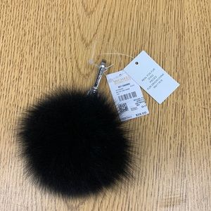 Michael Kors Large fluff ball. Black fluff ball with silver hardware.